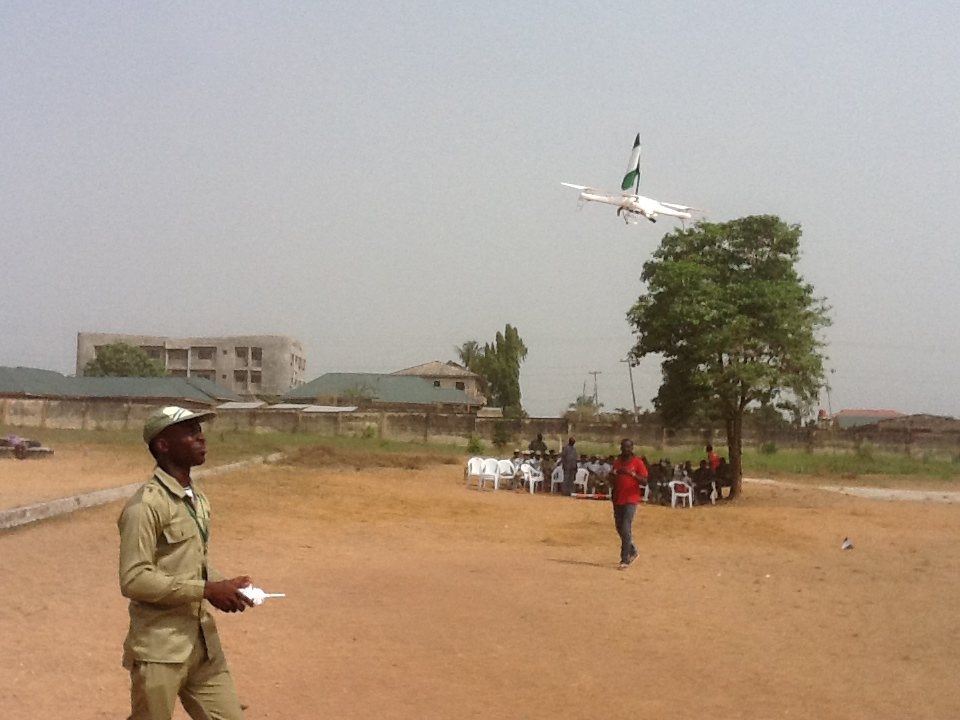 Olaolu Ayoola, displaying the drone he built.